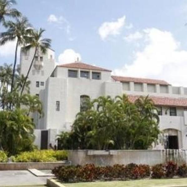 a tree in front of a building