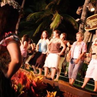 a group of people around each other