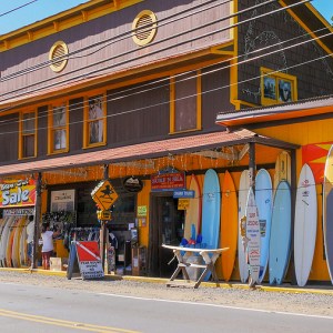 a train is parked on the side of a building