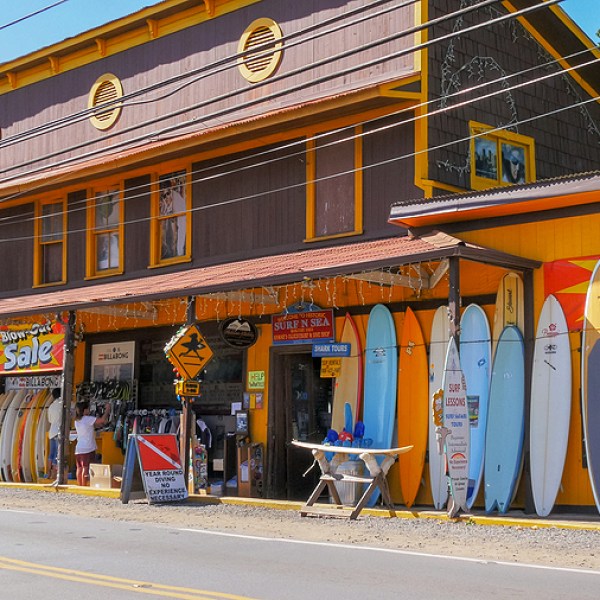 a train is parked on the side of a building