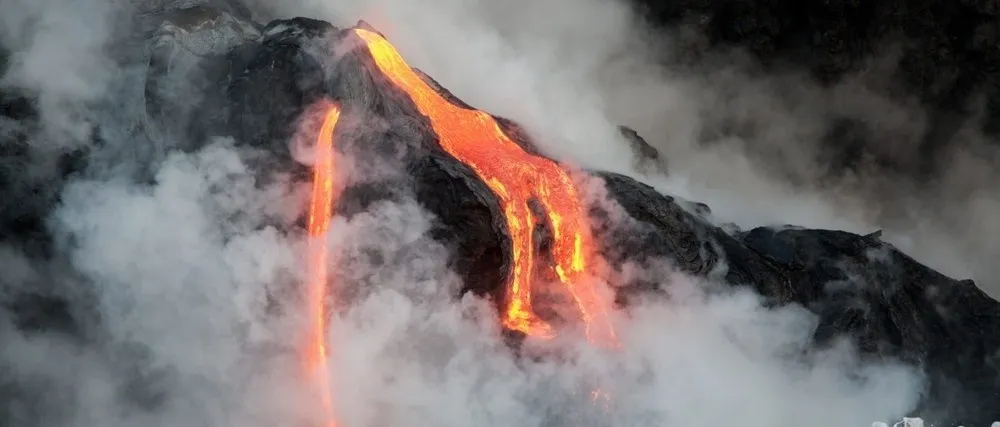 Kona: Private Tour: Volcano National Park and Rainbow Falls Private Tour Image 2 a lot of smoke around it
